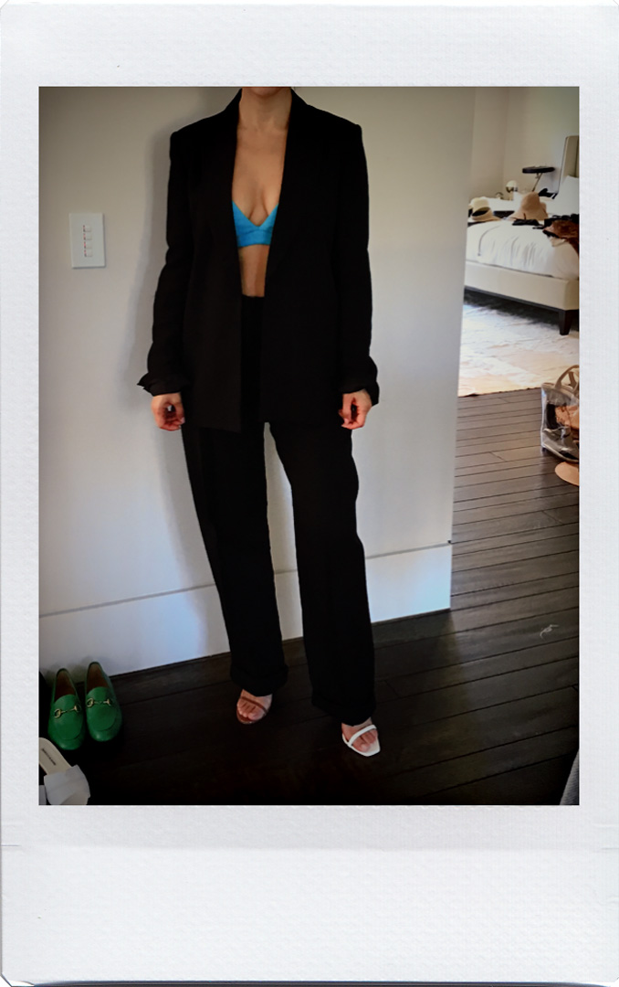 Kourtney Kardashian wearing black suit