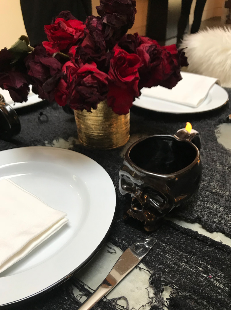 Kourtney Kardashian Halloween table with red roses
