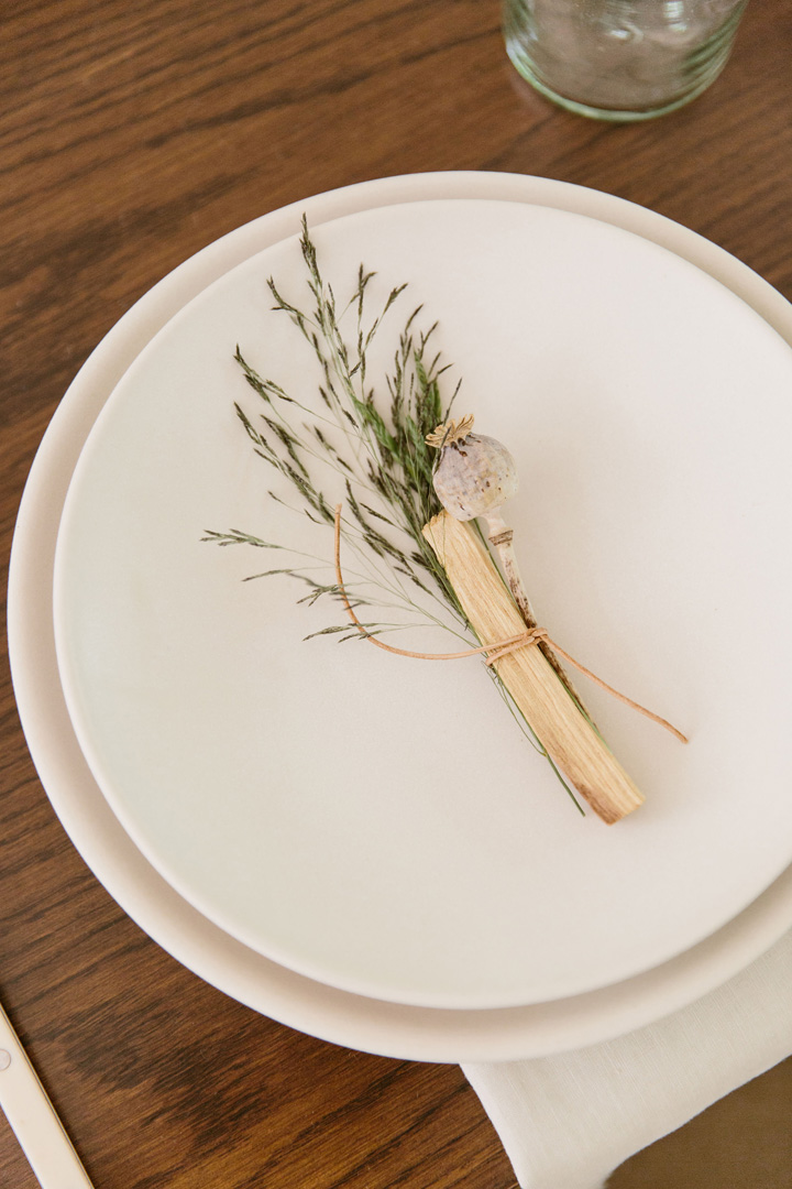 place setting with plate and sage stick