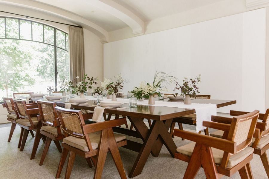 chairs in kourtney kardashian&#8217;s dining room with tablescape