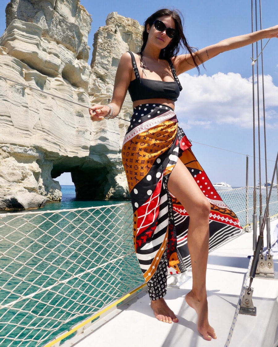 dani michelle wearing sarong on a boat