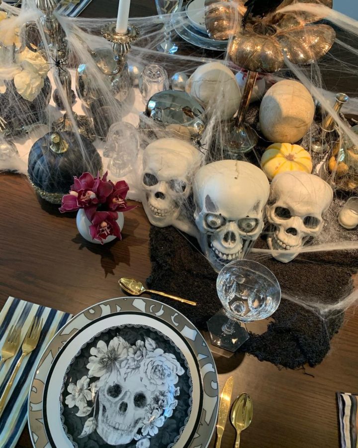 Kourtney Kardashian spooky halloween tablescape with skulls