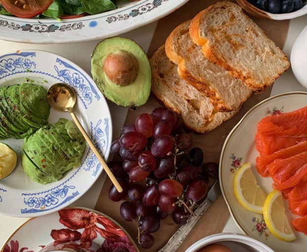 Healthy foods and tea spread out on table