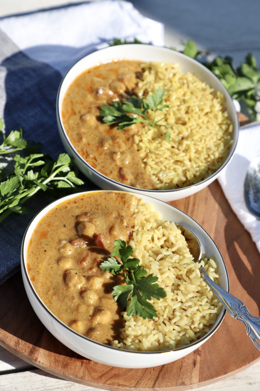 close up of two bowls of Plant-Based Tikka Masala with rice