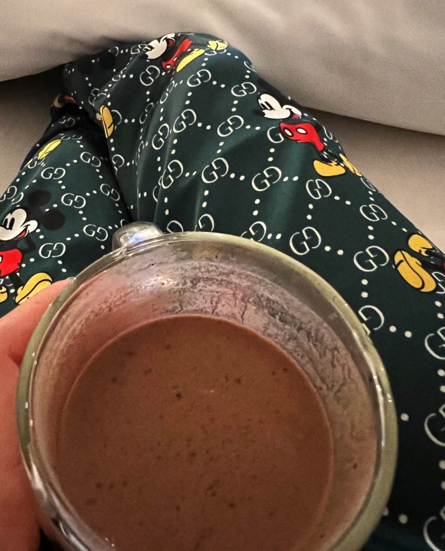 Kourtney Kardashian drinking her Cacao Recipe in silk pjs