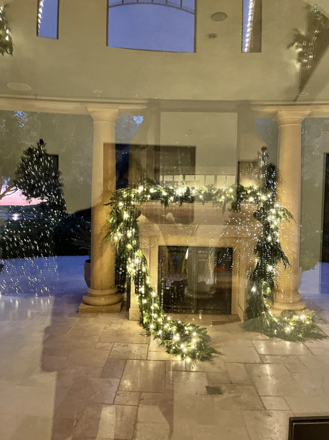 Kourtney Kardashian Christmas decor 2021 reflection outdoor fireplace