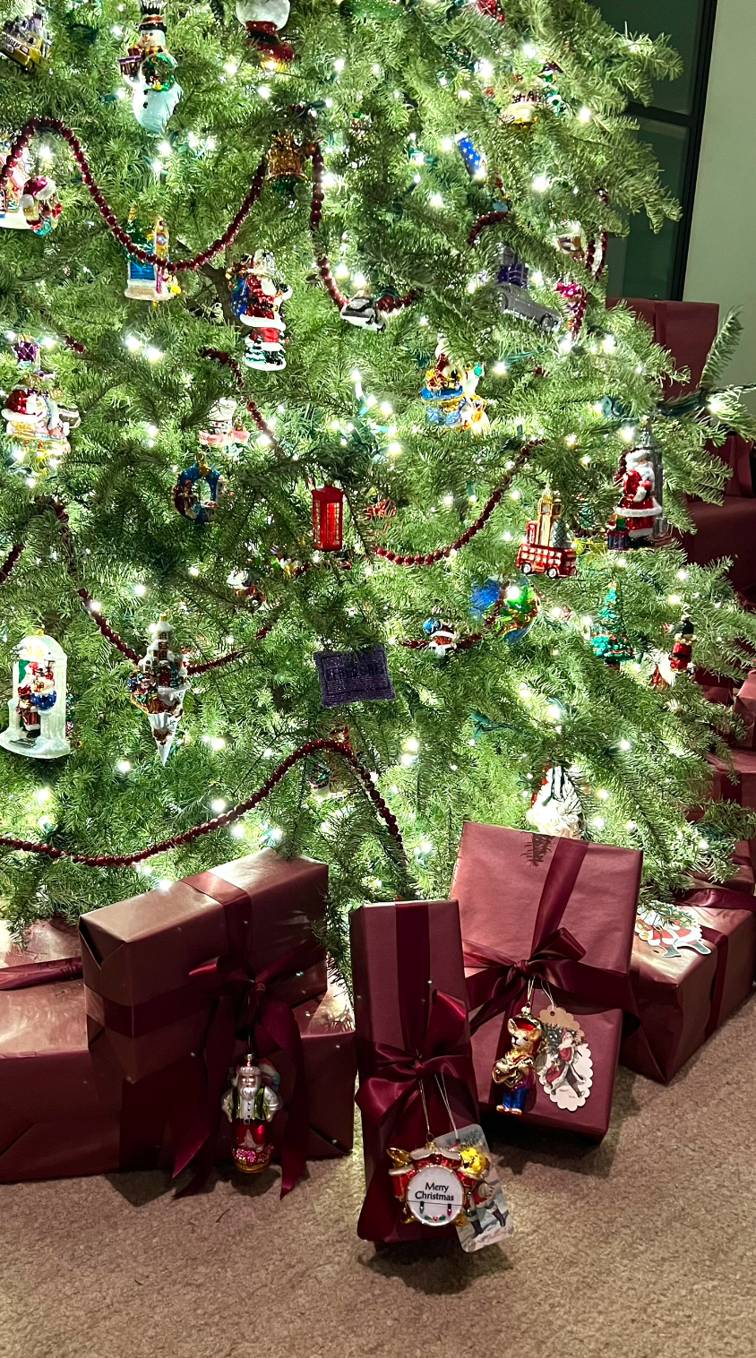kris jenner wrapped christmas presents under tree 2021