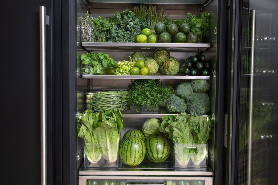 Kris Jenner refrigerator greens section close up