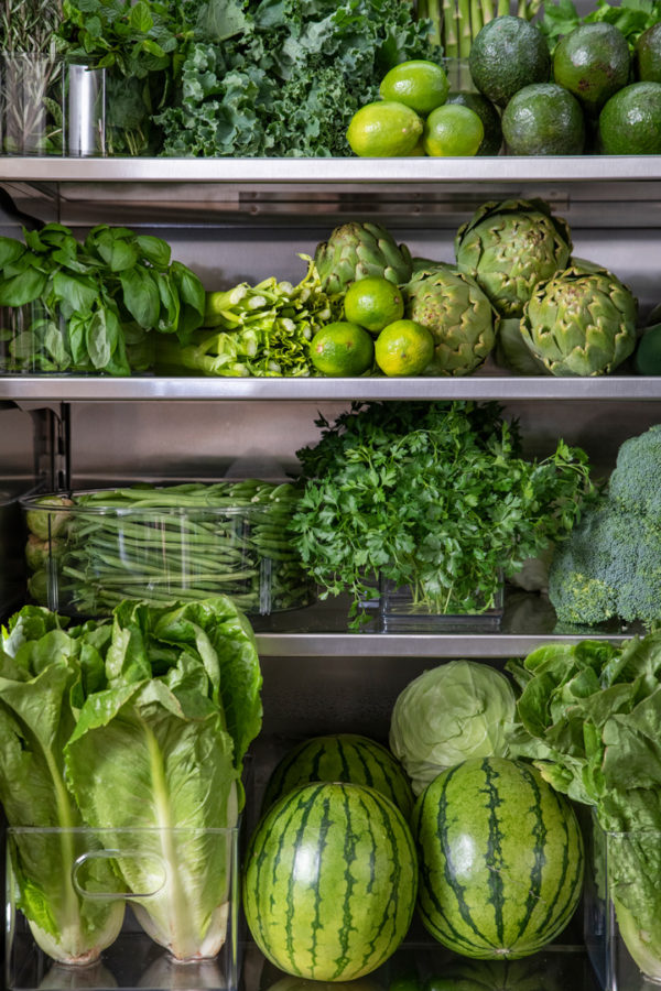 Kris Jenner refrigerator close up of greens