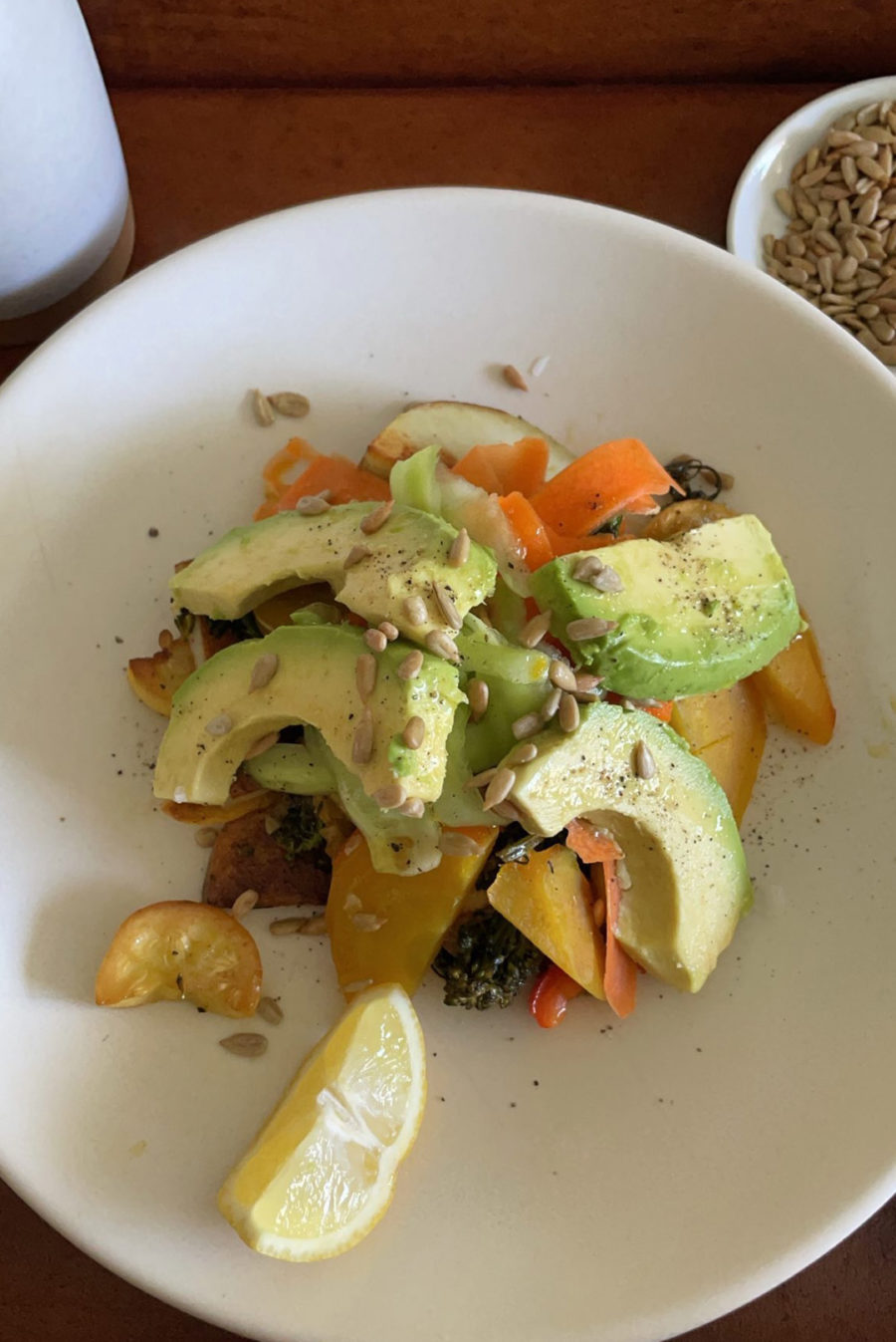 kourtney kardashian summer salad on plate in bed