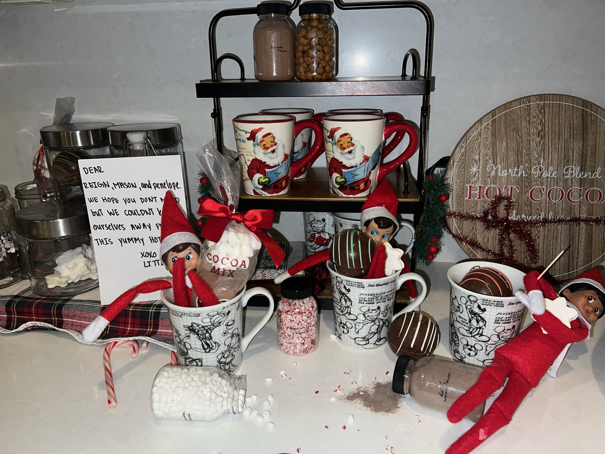 KKB Holiday Decor Elf on the shelf in Cocoa mess