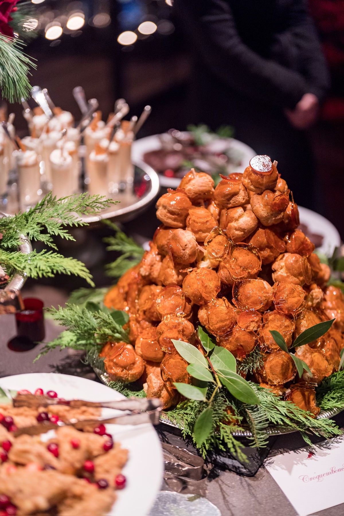 Vegan food piled artfully on bed of greens at Vegan food spread at Kourtney Kardashian Barker Christmas Eve 2022 party