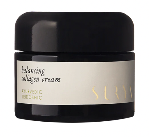 Black jar with cream colored paper label and gold type surya balancing collagen cream