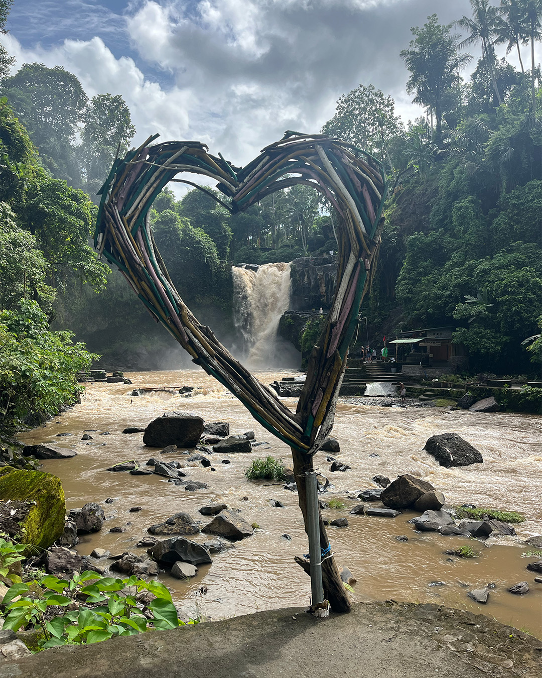 Heart made of twines with waterfall view