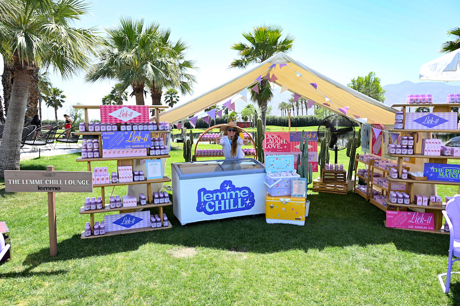 An outdoor booth full of Lemme products