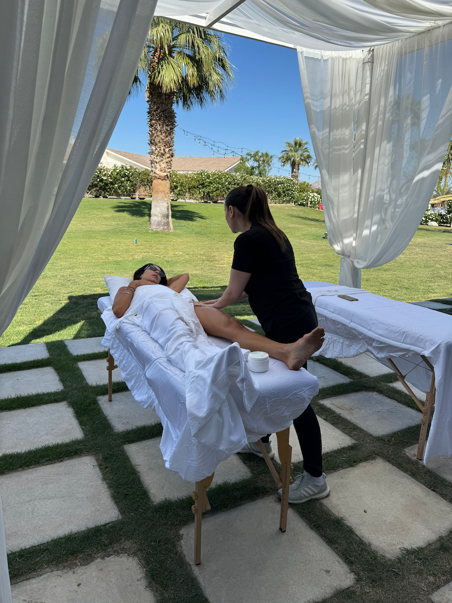 A woman getting an outdoor lymphatic massage.
