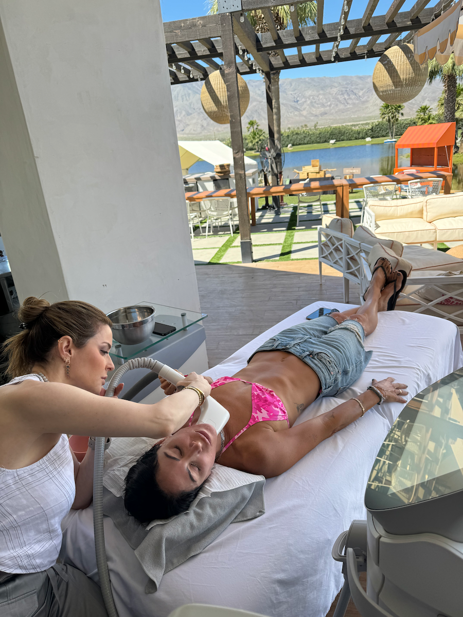 A woman getting a skincare treatment outdoors