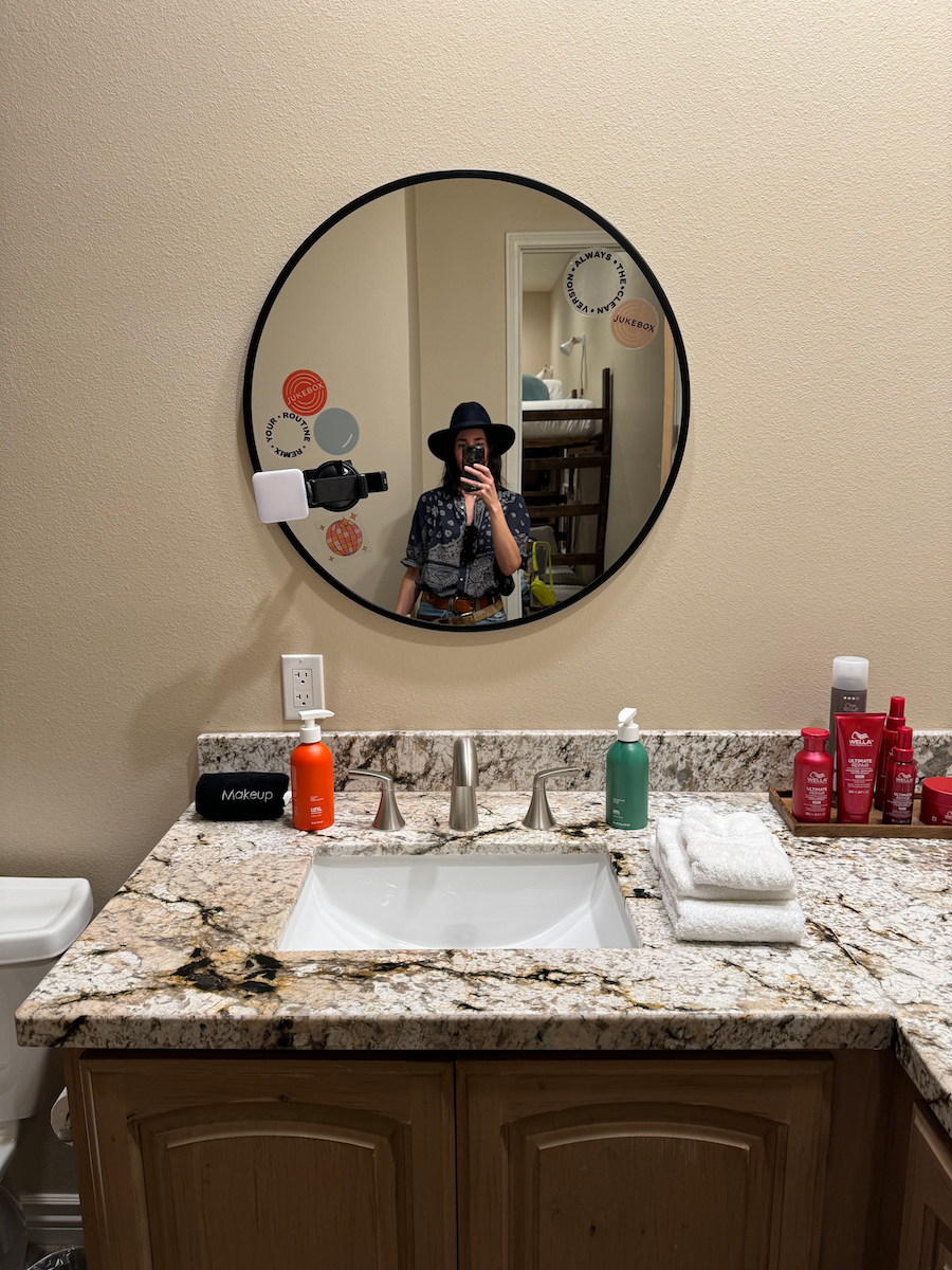 A woman taking a mirror selfie