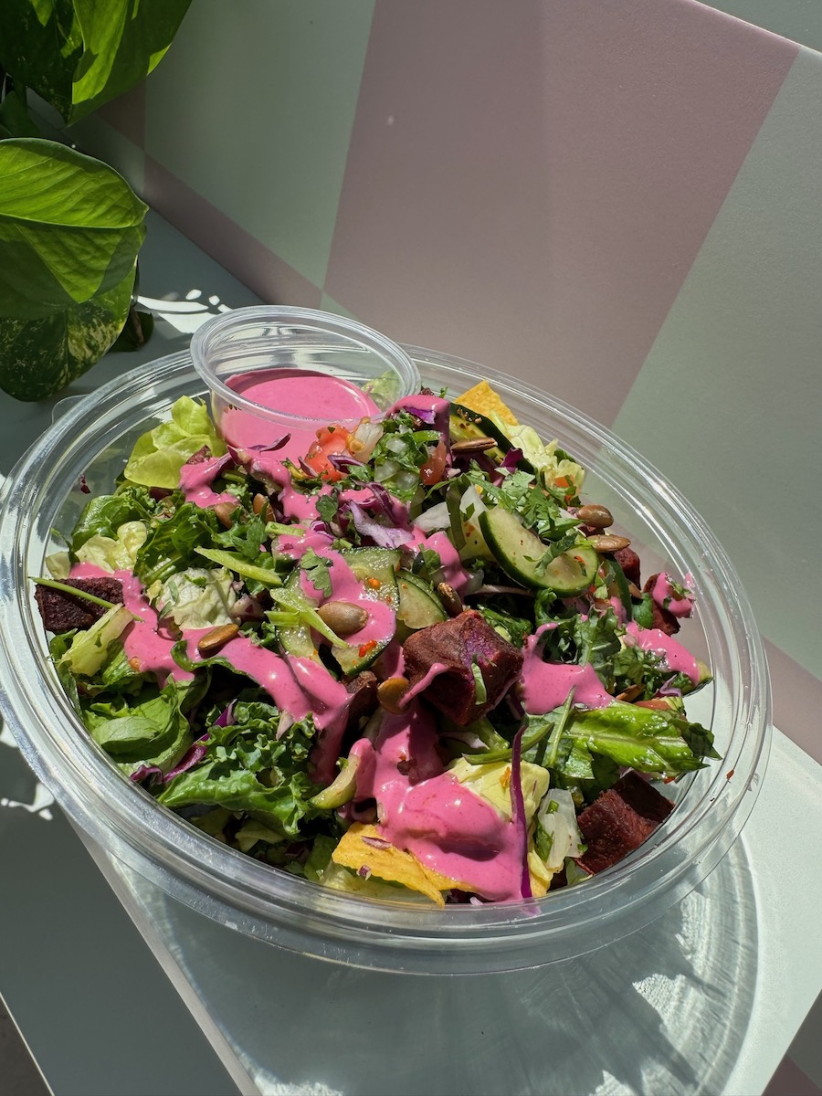 Pic of a salad with pink dressing