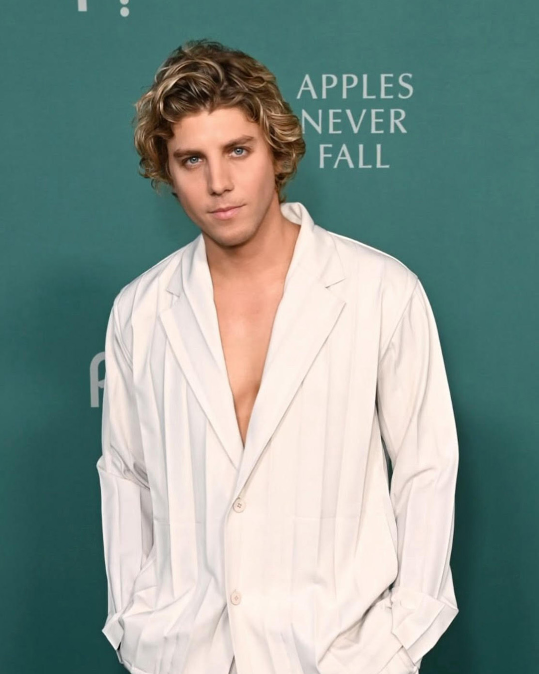 Lukas Gage on a step and repeat