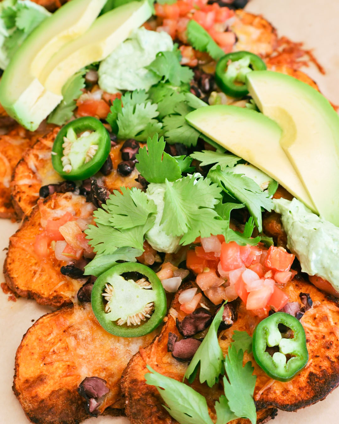 Sweet Potato Nachos with Avocado Lime Crema